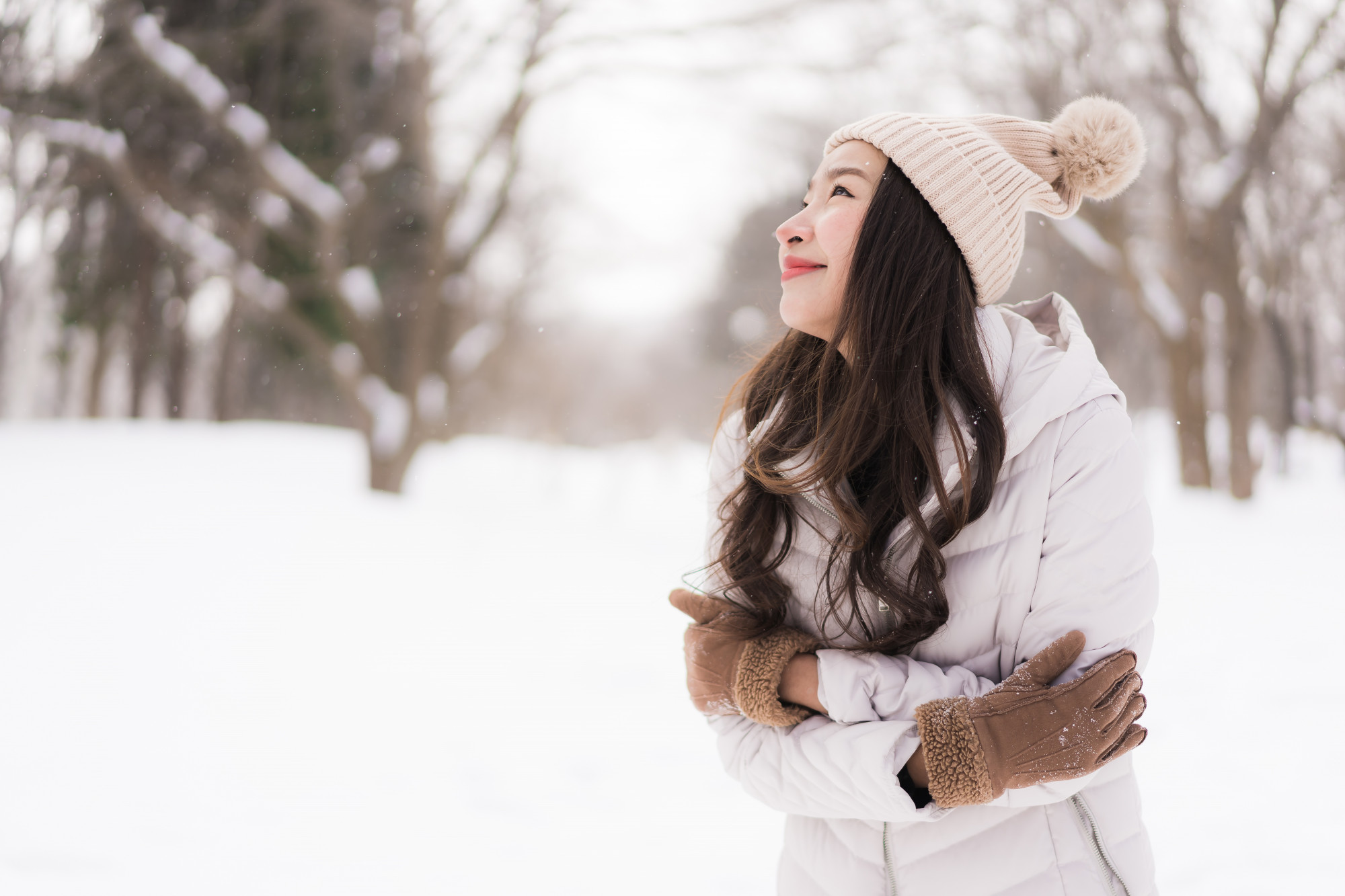 Woman in a snowy winter setting.