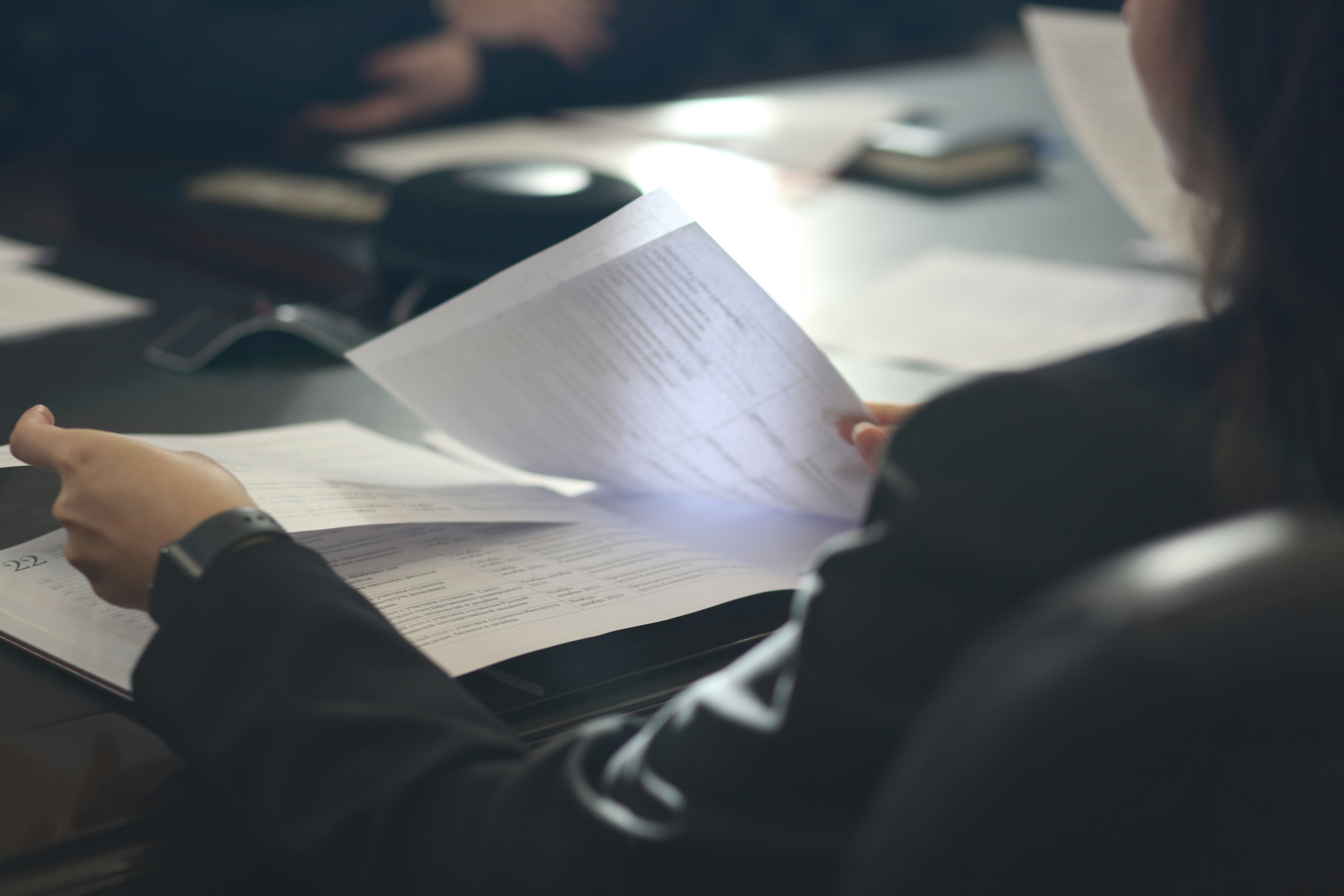 Woman reviewing documents.