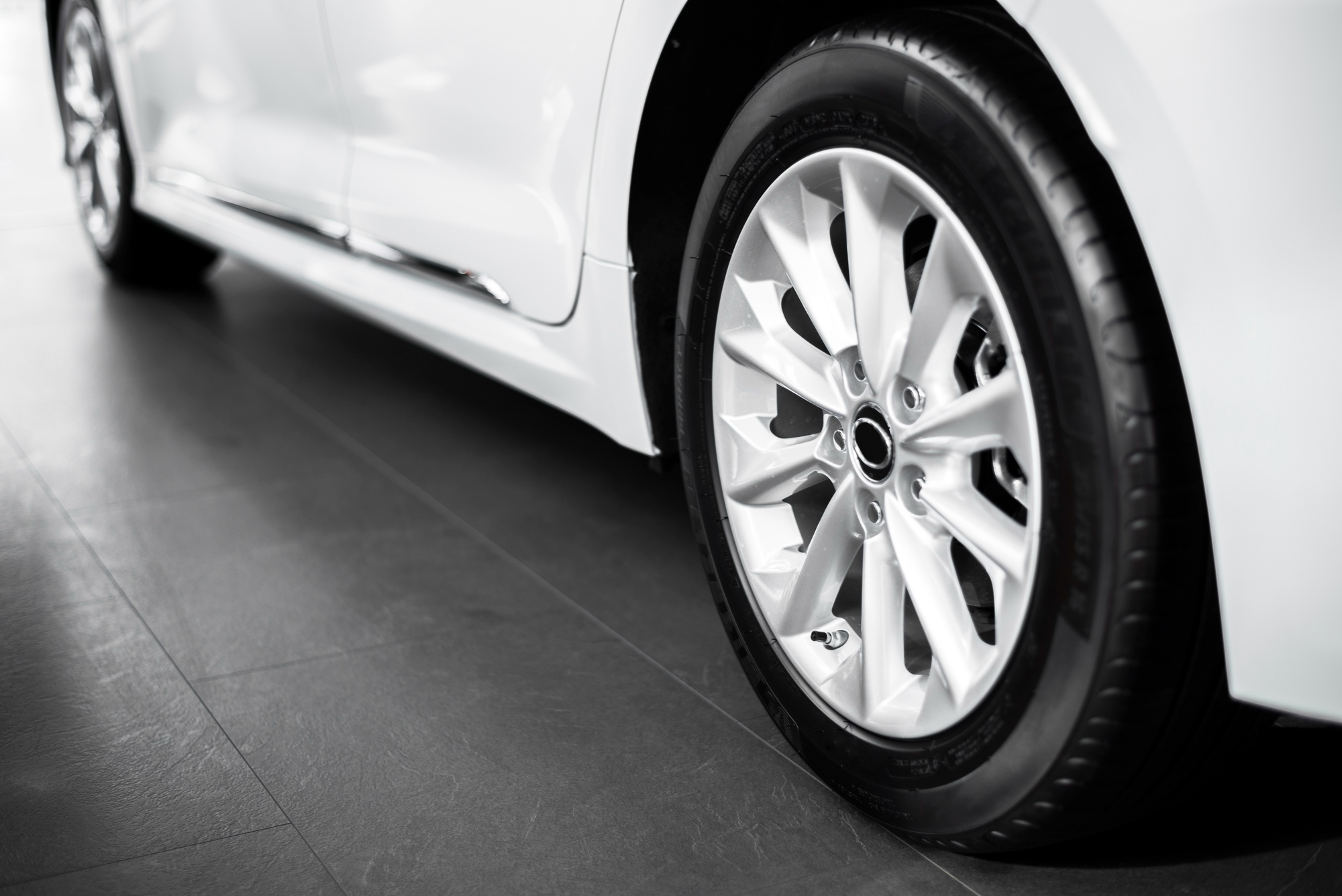 A photo of a car's wheels